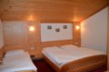 Sp�l�a s dvojl��kom, samostatnou poste�ou a dreven�m obkladom
