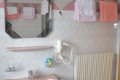 Ru�ov� um�vadlo pod zrkadlom, n�stenn� su�i� vlasov a radi�tor